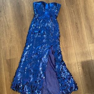 Royal blue sequined Sherri Hill Sweetheart neck dress hi split in the leg.